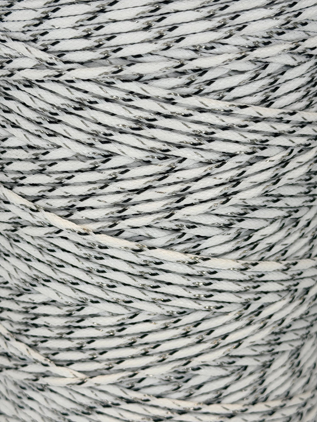 Close-up of gray and white textured yarn